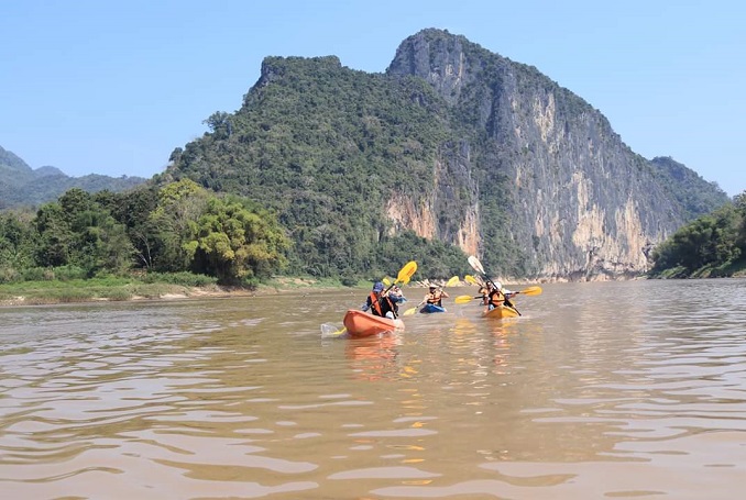 Kayaking to Pak Ou caves, traditional villages & Kuang Si waterfall 1 day tour